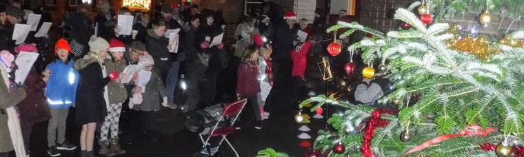 Carols Around the Tree banner