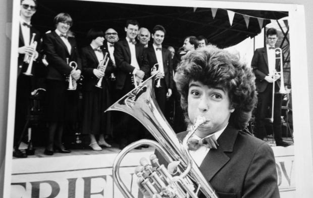 Entertainer - a 24-year-old Paul Menahen shows his ability playing the tenor horn during a performance in 1988