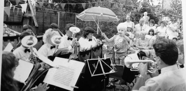 Cute conductor - three-year-old Andrew Sheldon shows his authority at an incredibly young age by conducting the Castle Point Brass Band